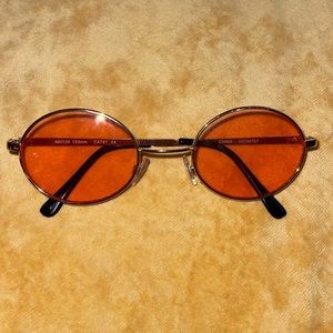 Small Pink Lens Oval Sunglasses with Gold Frame